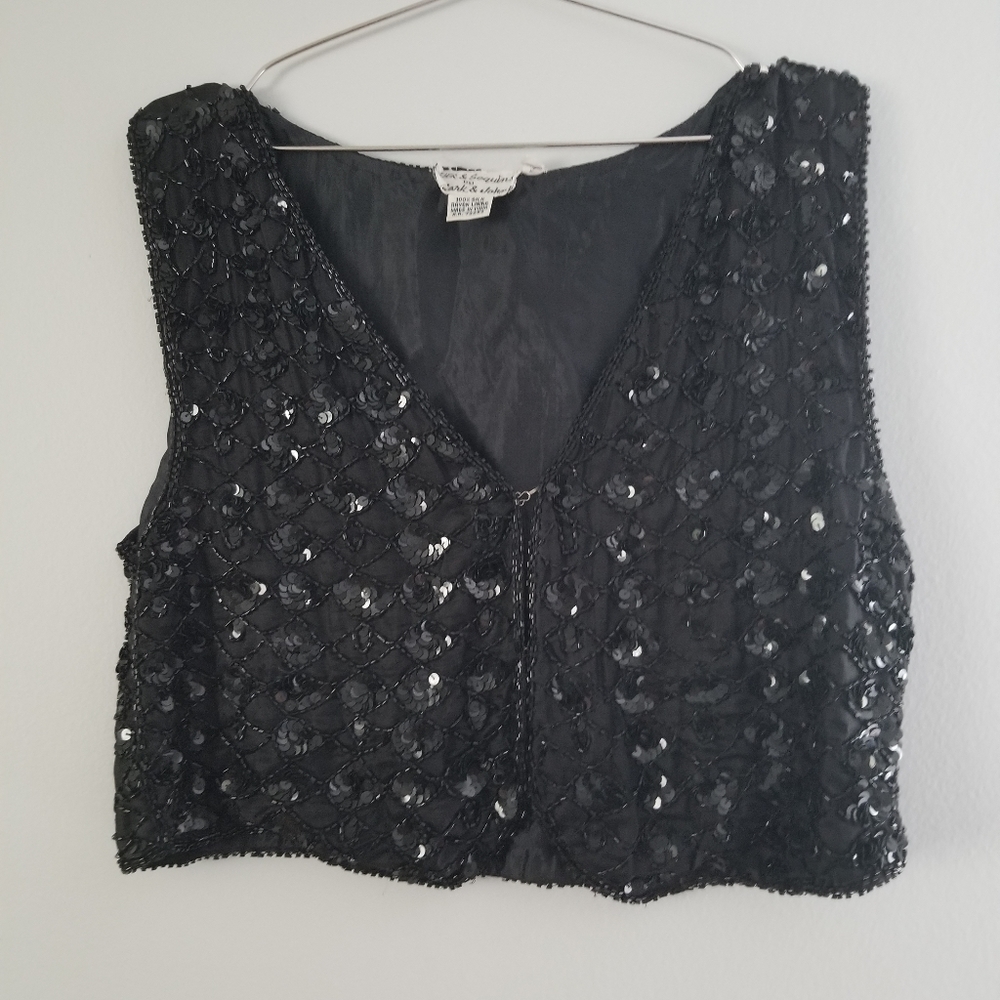 Sequins and beads blouse.